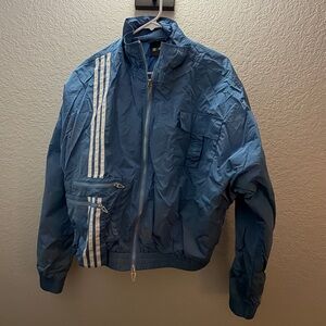 IVY PARK Blue Windbreaker with White Stripe Accents